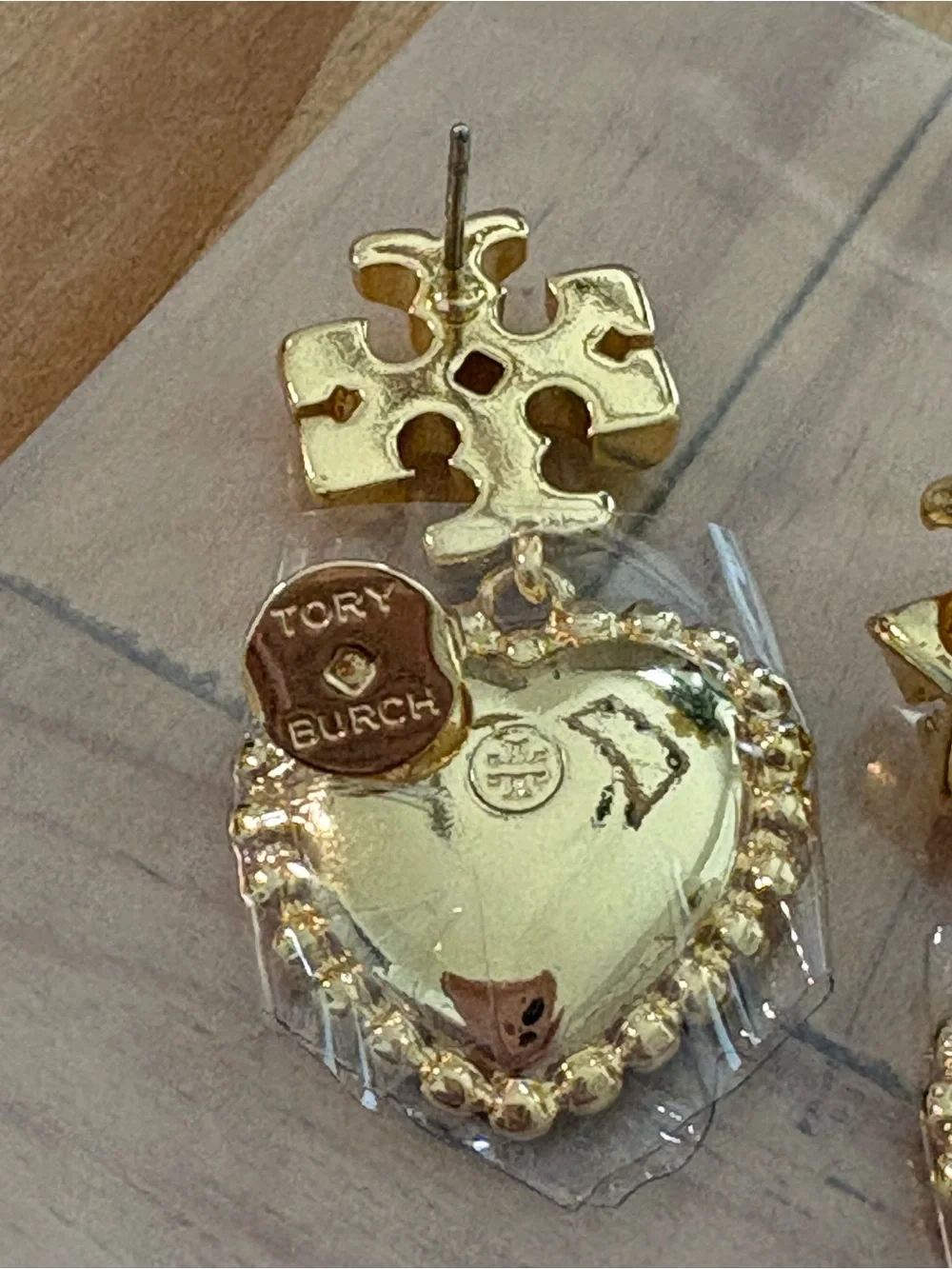 Gold Heart Drop Earrings with White Stone Accents
